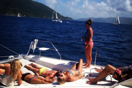 sunbathing on the yacht | Kindred Spirit - St. John USVI Catamaran Charter sunbathing on the yacht